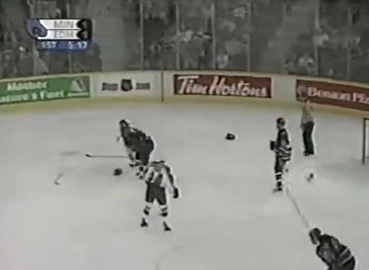 M. Johnson (MIN) vs. G. Laraque (EDM)