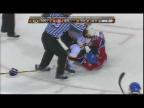 M. Lucic (BOS) vs. M. Komisarek (MON)