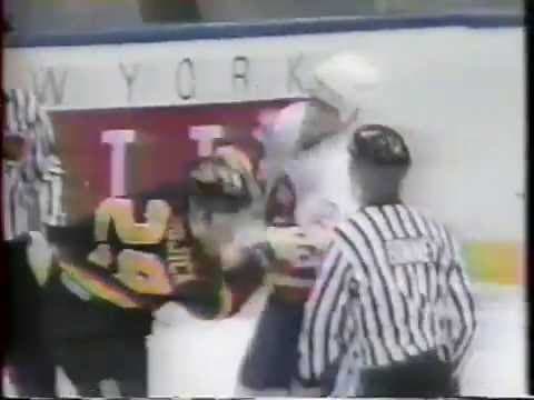 G. Odjick (VAN) vs. M. Vukota (NYI)