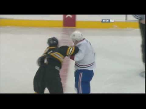 M. Komisarek (MON) vs. M. Lucic (BOS)