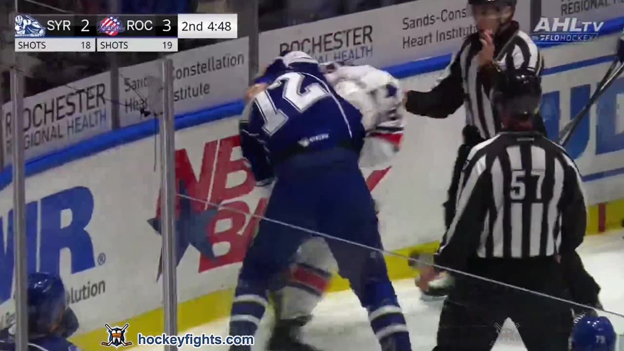 D. Carlile (SYR) vs. V. Komarov (ROC)