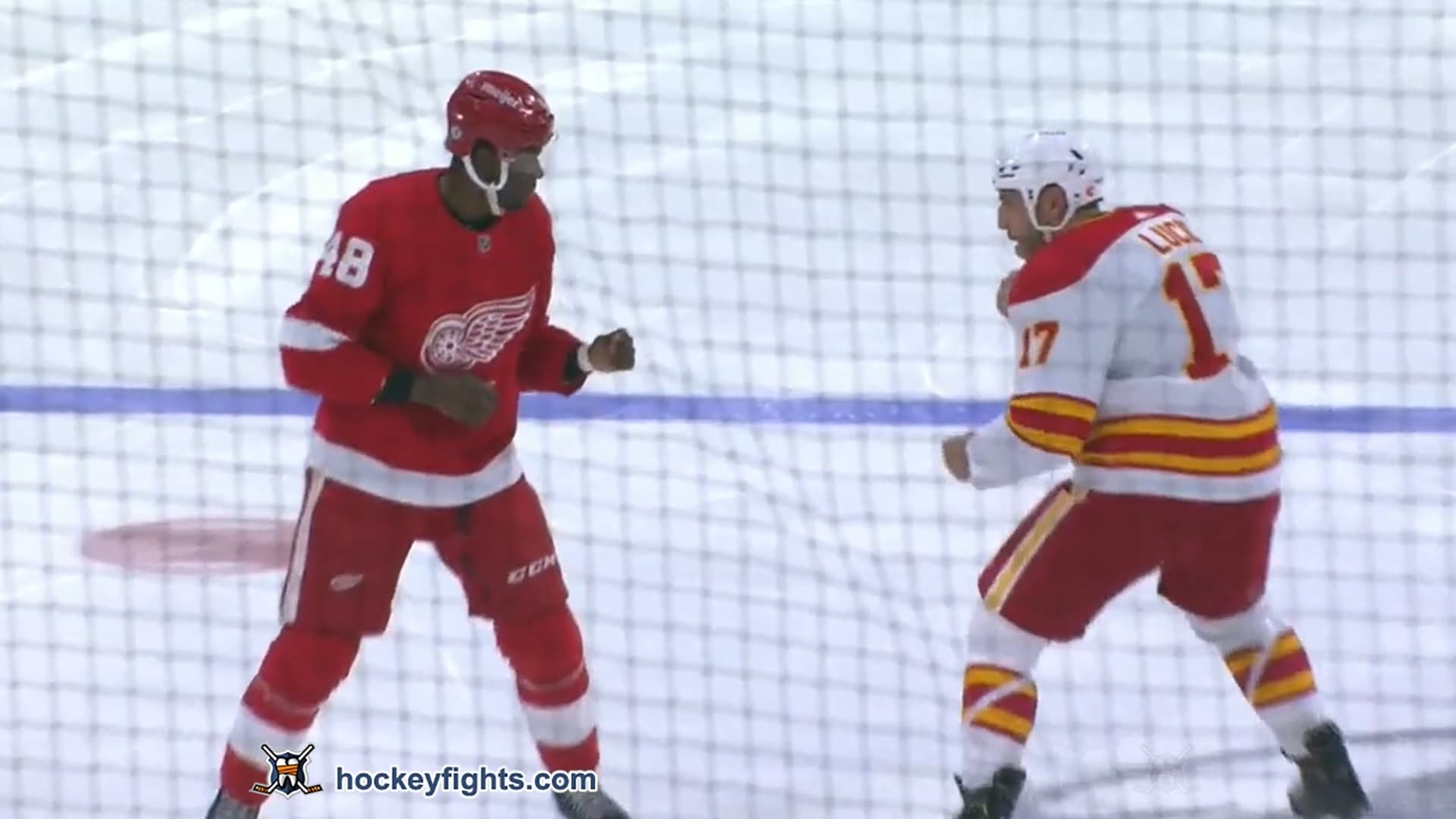 M. Lucic (CGY) vs. G. Smith (DET)