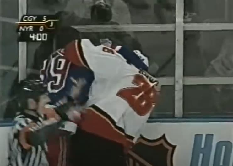 R. Regehr (CGY) vs. D. LaCouture (NYR)