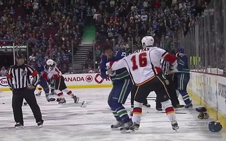 Canucks and Flames Start Game With Line Brawl